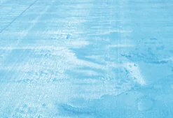 BACHE A BULLES PISCINE BOIS INDIANA BORDEE 4 COTES